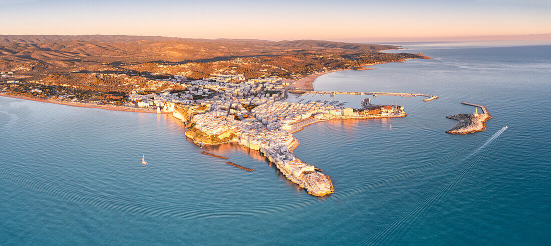 Aerial view of old town and lighthouse of Vieste at dawn, Foggia province, Gargano National Park, Apulia, Italy