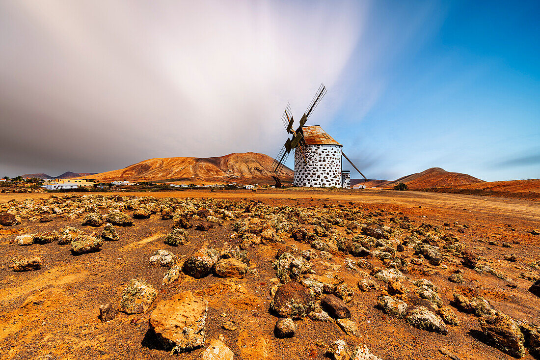 The old windmill Molinos de Villaverde in the volcanic landscape, La Oliva, Fuerteventura, Canary Islands, Spain
