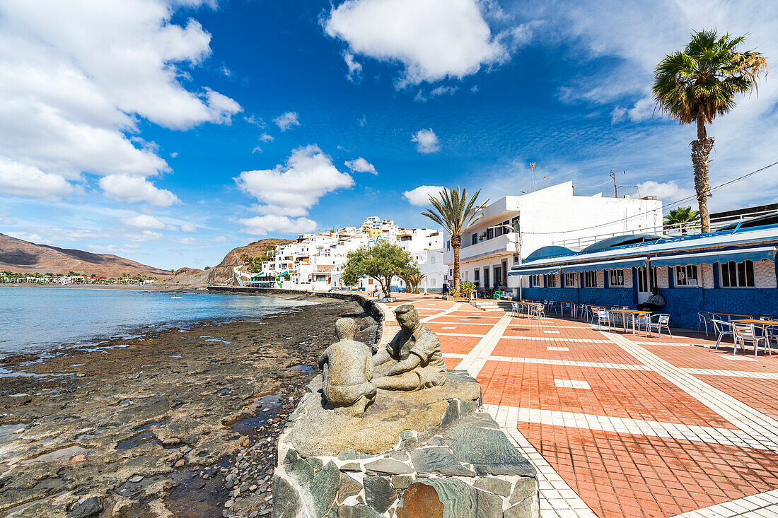Restaurants on promenade of the seaside village of Las Playitas, Fuerteventura, Canary Islands, Spain