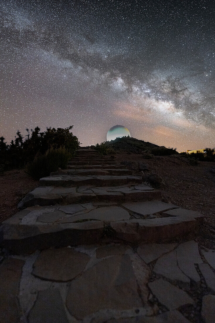 Footpath to the radar station on top of Pico do Arieiro mountain under the Milky Way, Madeira island, Portugal