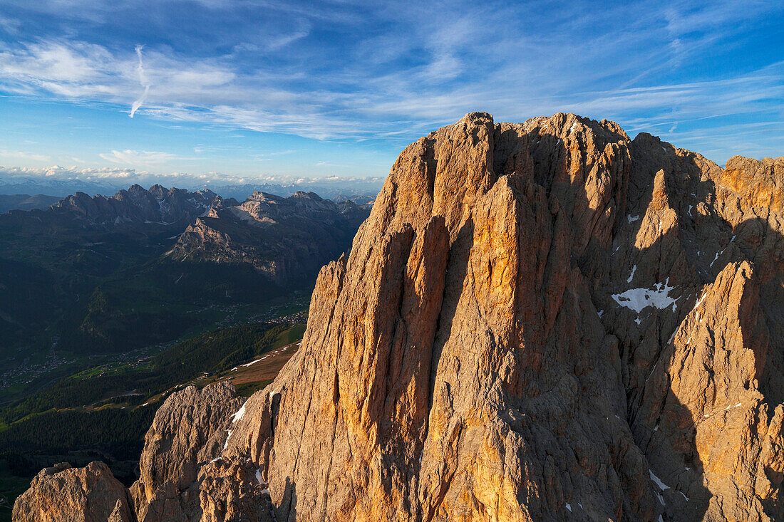 Aerial view of Sassolungo group at sunset, Dolomites, South Tyrol, Italy