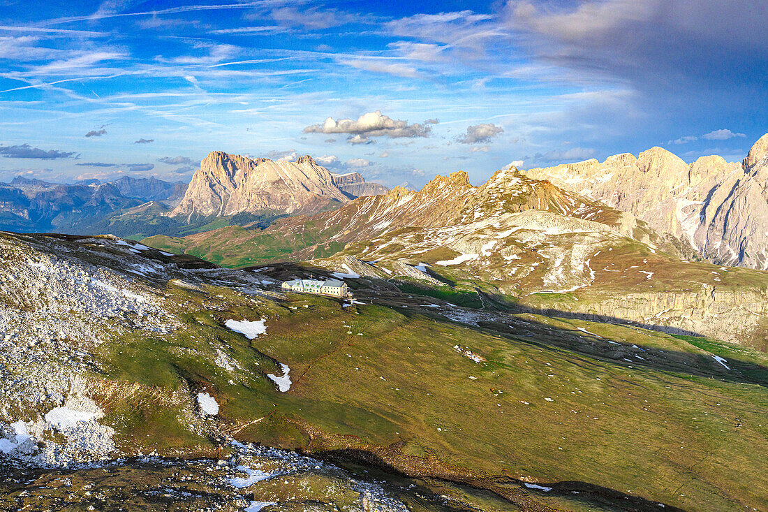 Aerial view of Sciliar massif with Rifugio Bolzano, Sassopiatto and Sassolungo on background, Dolomites, South Tyrol, Italy