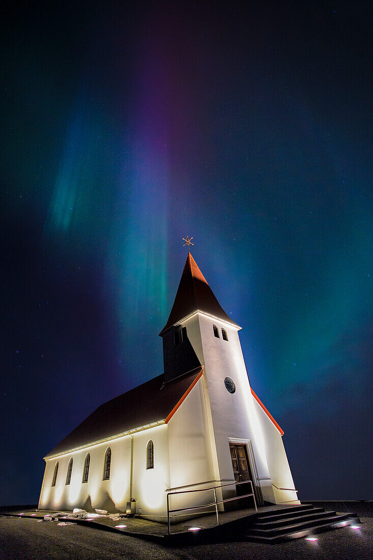 Vik i Myrdal church under northern lights, Southern Iceland, Sudurland, Iceland, Northern Europe