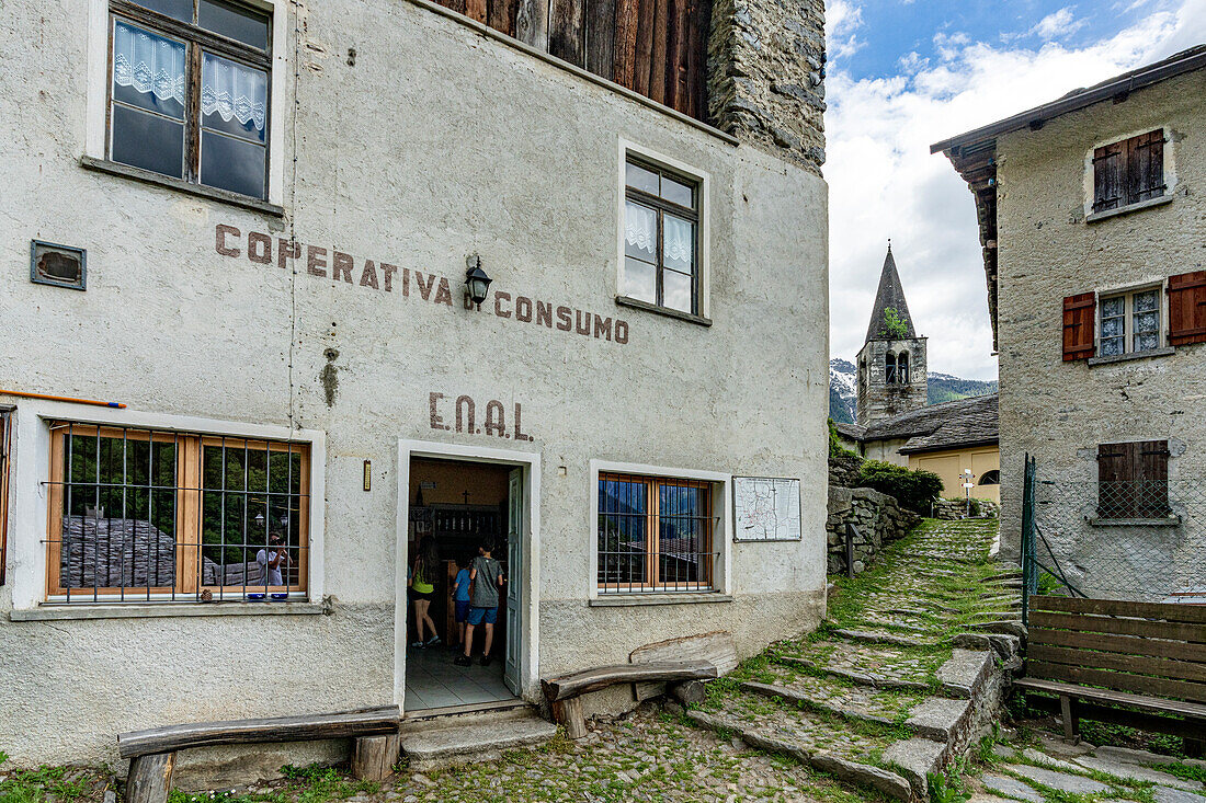 Children in the alpine village of Savogno in summer, Valchiavenna, Valtellina, Sondrio province, Lombardy, Italy