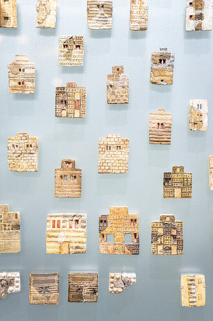 Clay handicraft objects hanging on a wall at the Heraklion Archaeological Museum, Crete island, Greece