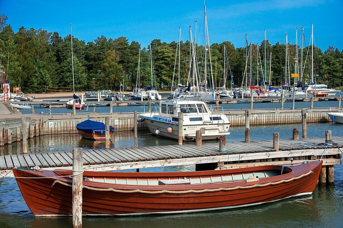 Boats in the Marina Nagu harbour or Nauvo island in Väståboland in Pargas in Southwest Finland Turku archipelago. The archipelago ring road or Saariston rengastie is full of things to see, do and do. The Archipelago Trail can be taken clockwise or counter clockwise, starting in the historical city of Turku, and continuing through rural archipelago villages and astonishing Baltic Sea sceneries. The Trail can be taken from the beginning of June until the end of August.