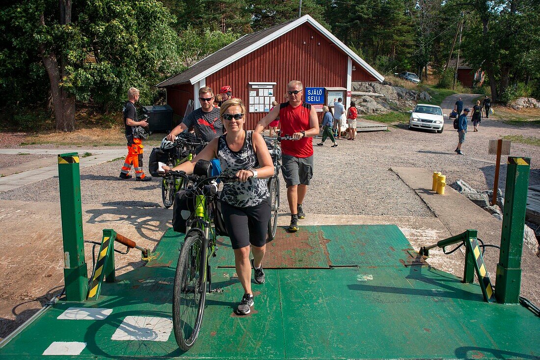 Bicycle inside public ferry from Nagu harbour or Nauvo island in Väståboland in Pargas to Seili Island in Southwest Finland Turku archipelago. The archipelago ring road or Saariston rengastie is full of things to see, do and do. The Archipelago Trail can be taken clockwise or counter clockwise, starting in the historical city of Turku, and continuing through rural archipelago villages and astonishing Baltic Sea sceneries. The Trail can be taken from the beginning of June until the end of August.