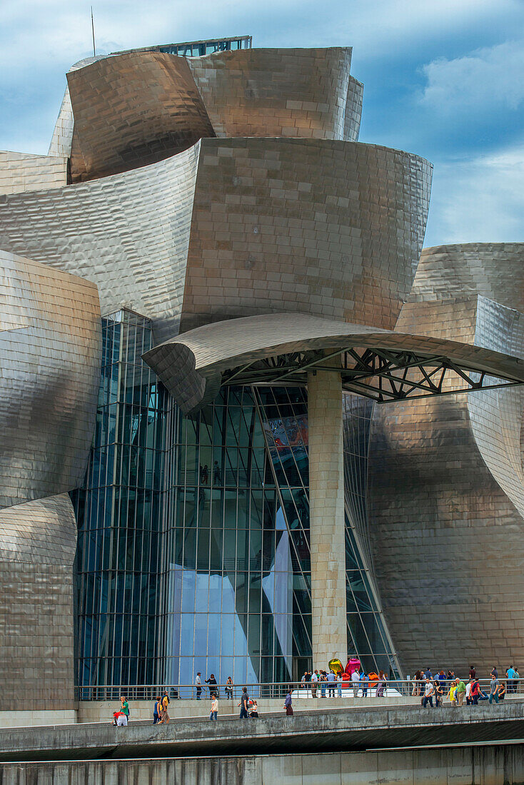 Spain travel city, view at sunset of the Frank Gehry designed Guggenheim Museum in the center of Bilbao, northern Spain.