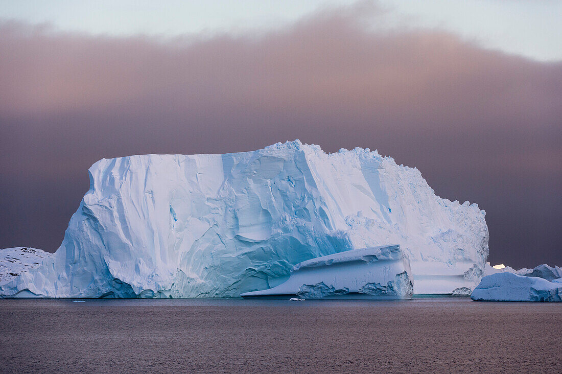 Icebergs under a stormy sky, Lemaire channel, Antarctica. Antarctica.