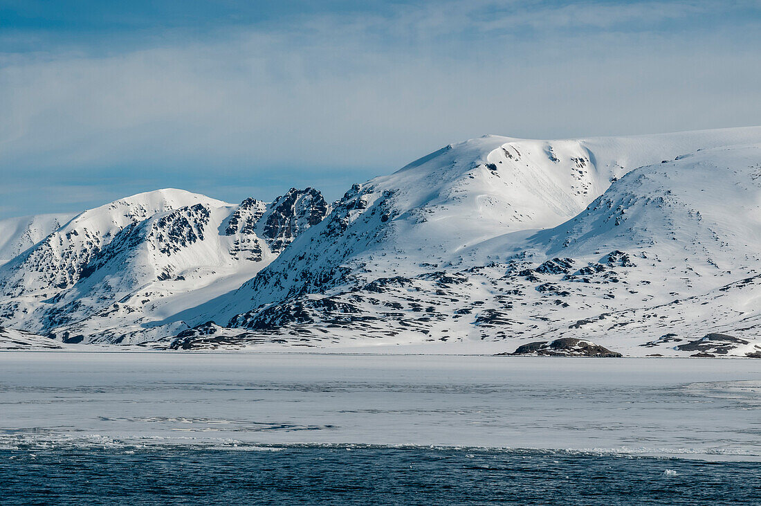 Monaco Glacier off the waters of the Arctic Ocean. Monaco Glacier, Spitsbergen Island, Svalbard, Norway.