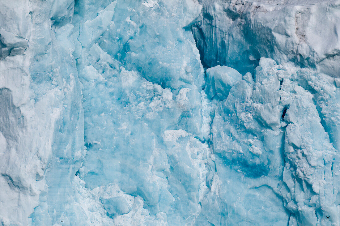 Blue ice in a wall of Lilliehook Glacier. Lilliehookfjorden, Spitsbergen Island, Svalbard, Norway.