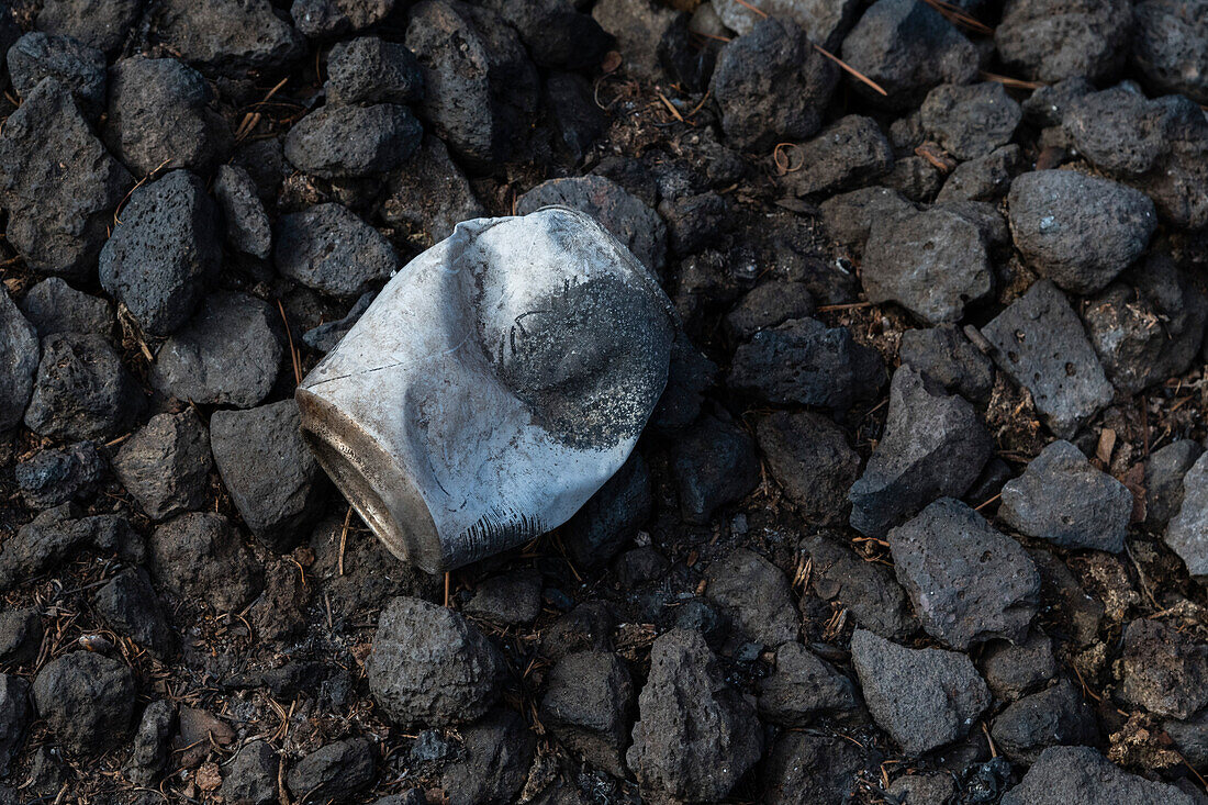 A burned soda can. La Palma Island, Canary Islands, Spain.