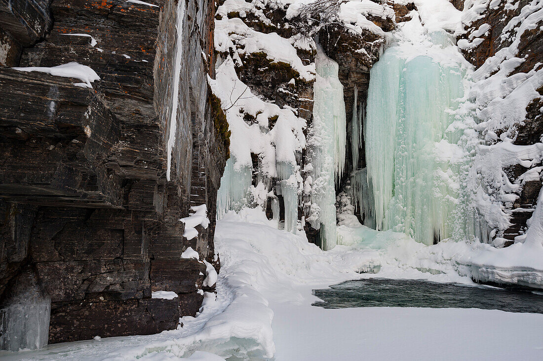 A Frozen waterfall in Sweden. Sweden.
