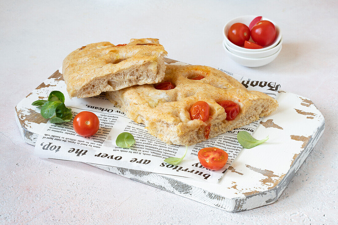 Focaccia with spring onions and cherry tomatoes