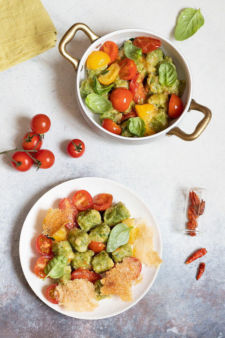 Strangolapreti (spinach-ricotta gnocchi, Italy) with tomatoes and parmesan wafers