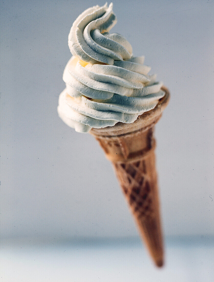Soft serve ice cream in a waffle cone