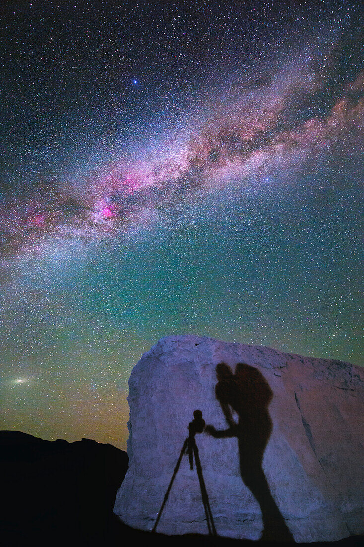 Milky Way over human shadow, Lut desert, Iran