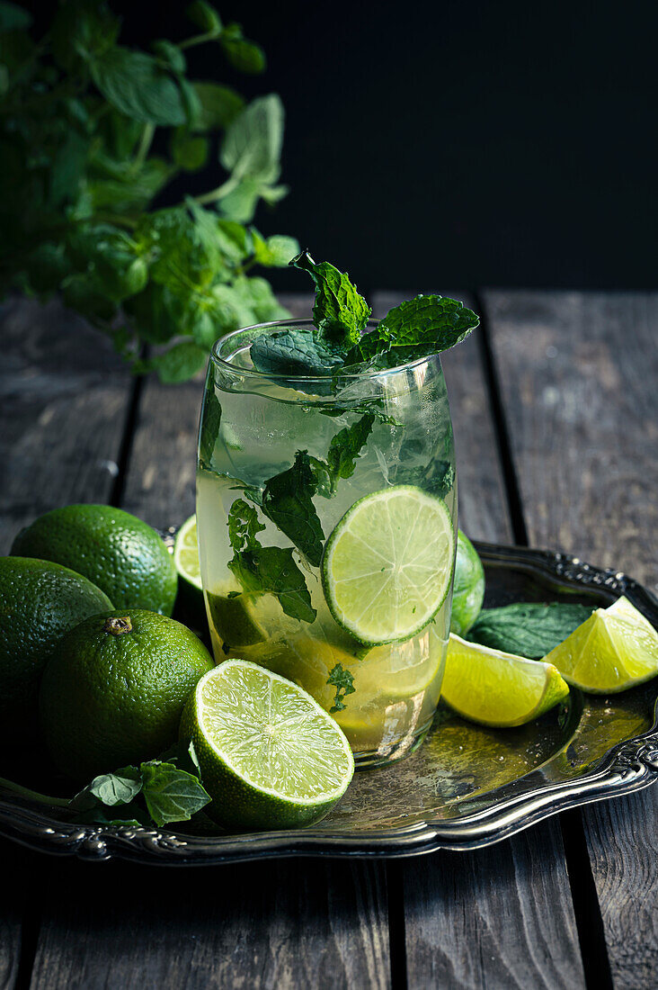 Mojito mocktail with lime and mint leaves