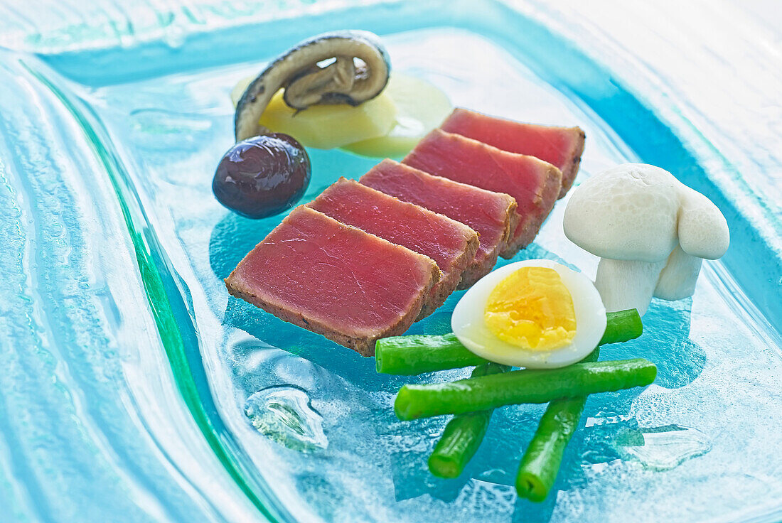 Roasted tuna with asparagus, egg and mushroom
