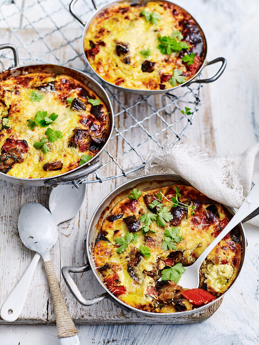 Eggplant and tomato bakes with yoghurt topping