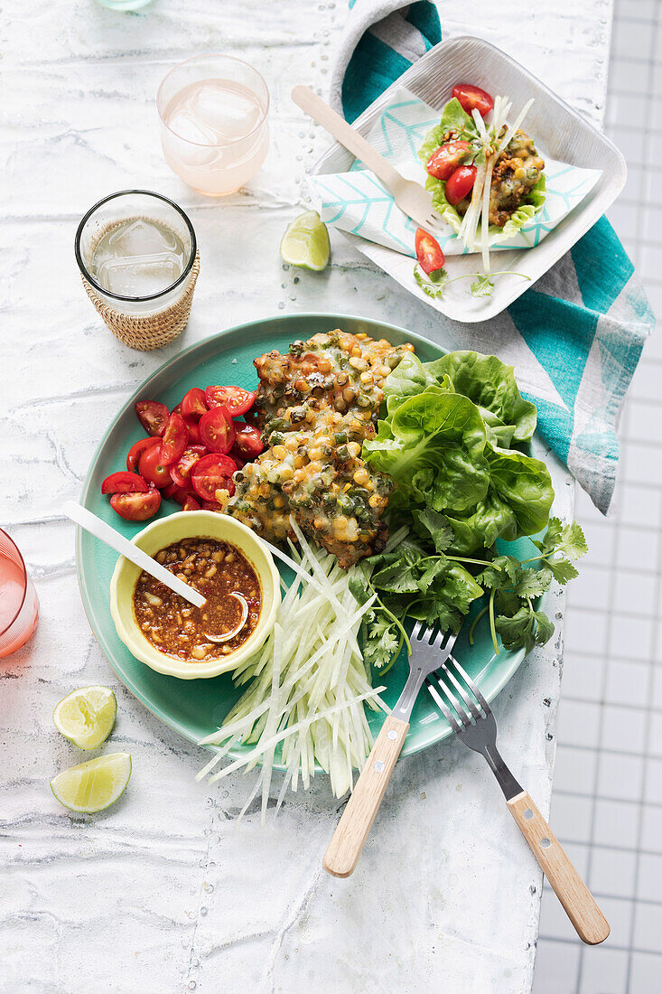 Corn fritters and green papaya salad