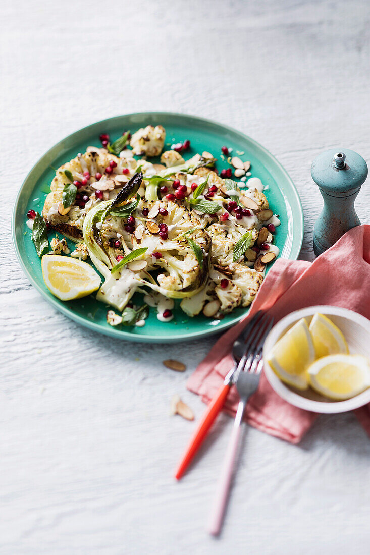 Cauliflower steaks with almonds and tahini