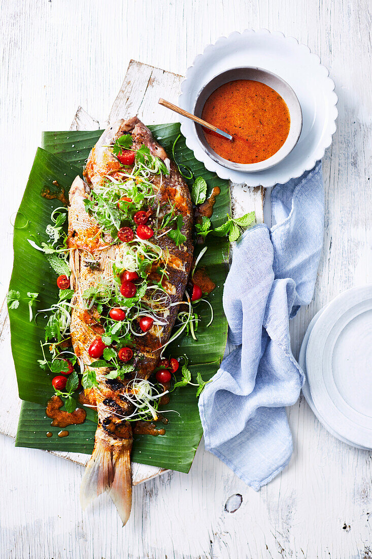 Snapper in banana leaves with thai herb salad