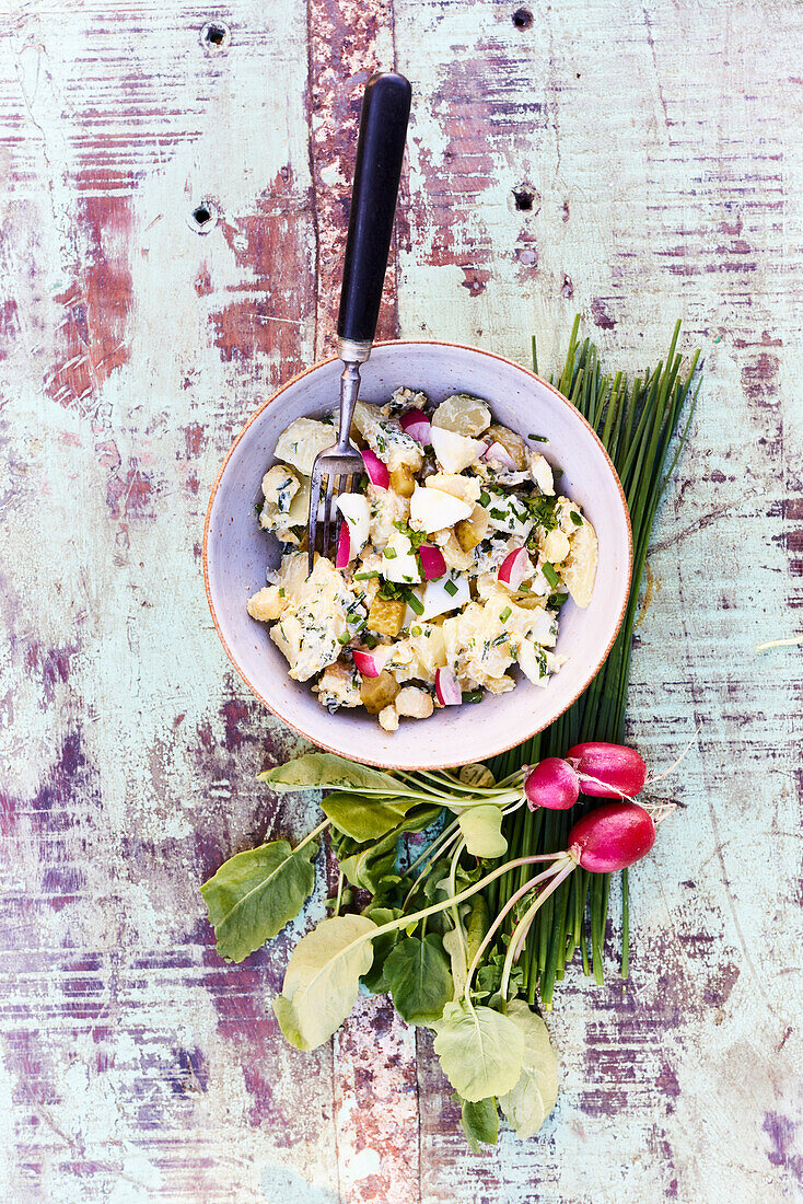 Potato salad with radishes and chives