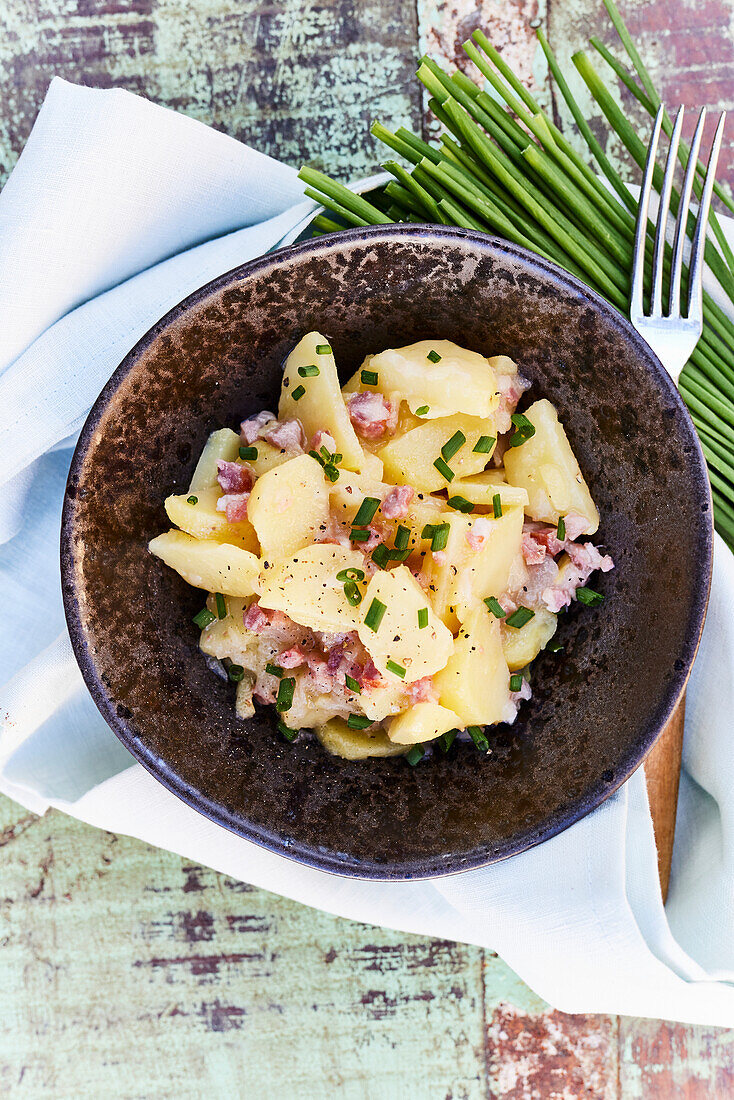 Potato salad with bacon and chives