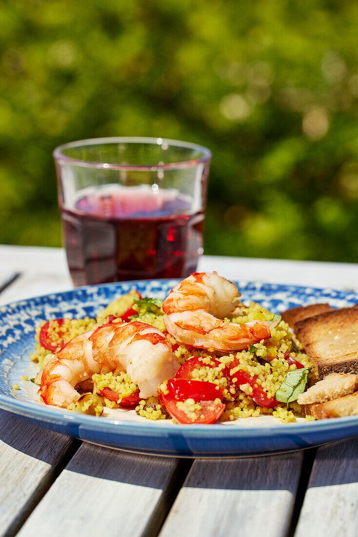 Tomato couscous with prawns