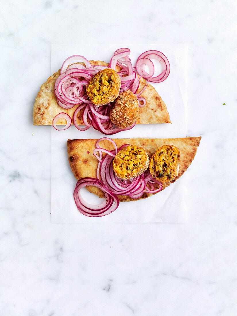 Flatbread with falafel and sumac onions