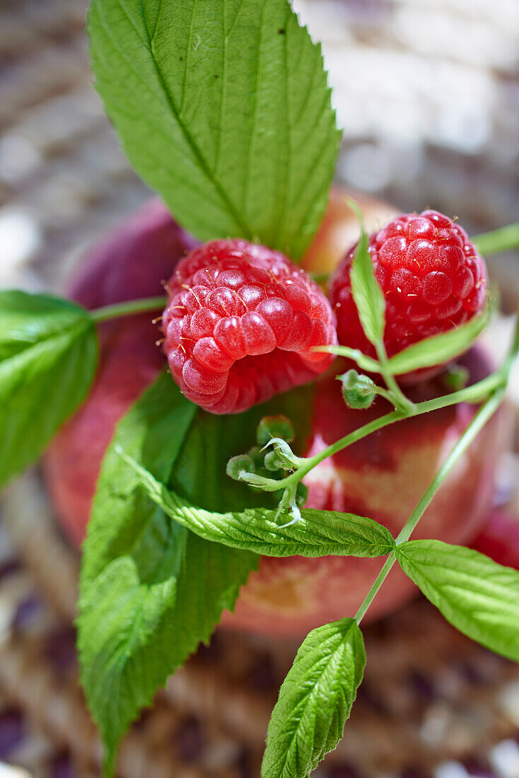 White peach and raspberries