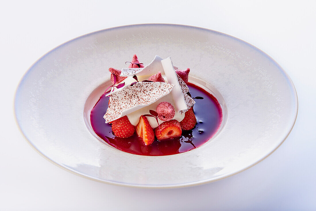 Strawberry dessert with coconut yoghurt and meringue