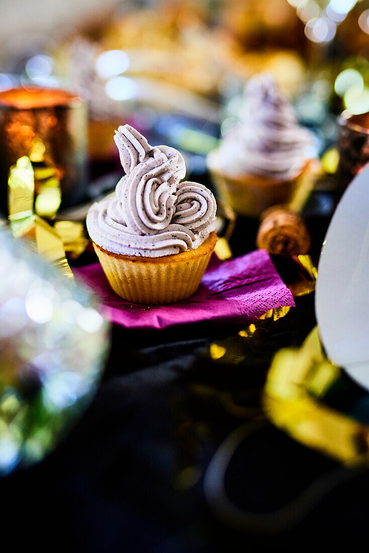 Cupcakes with blueberry frosting