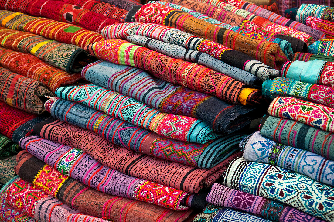 Woven Thai silk fabric for sale at the Night Market, Chiang Mai, Thailand.