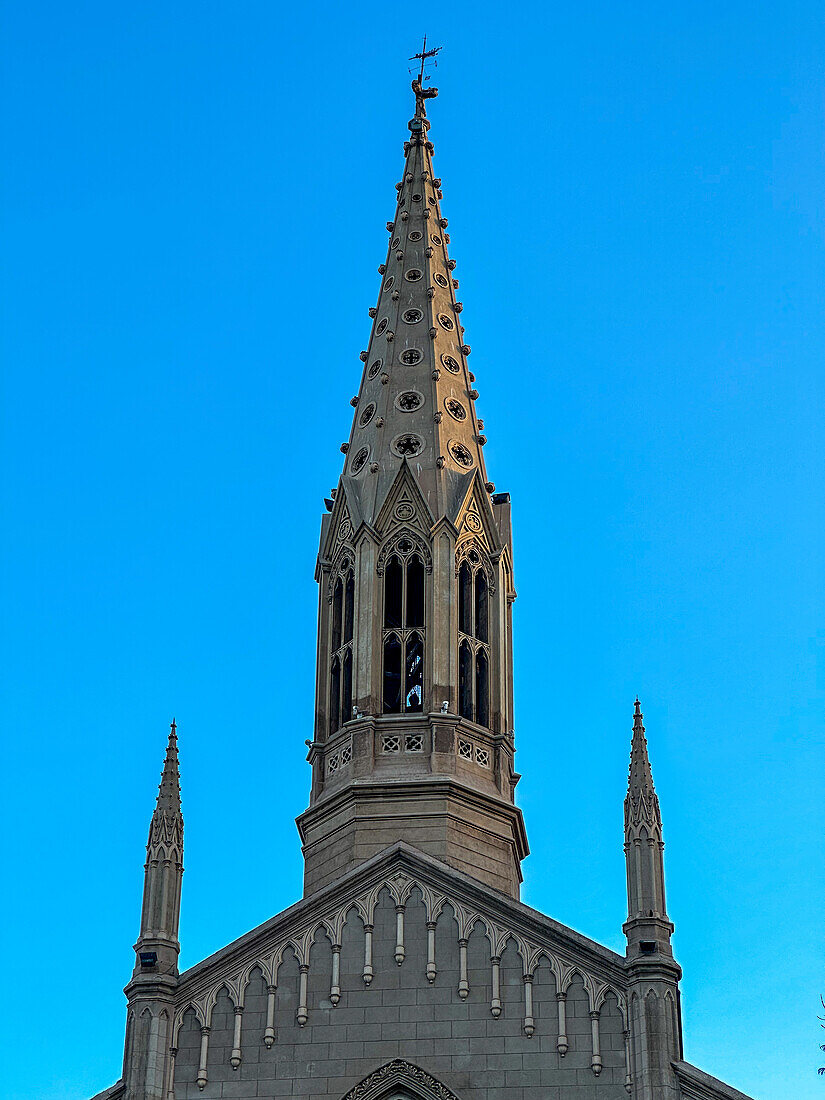 The spire of the San Vicente Ferrer Church in Godoy Cruz, Mendoza, Argentina.