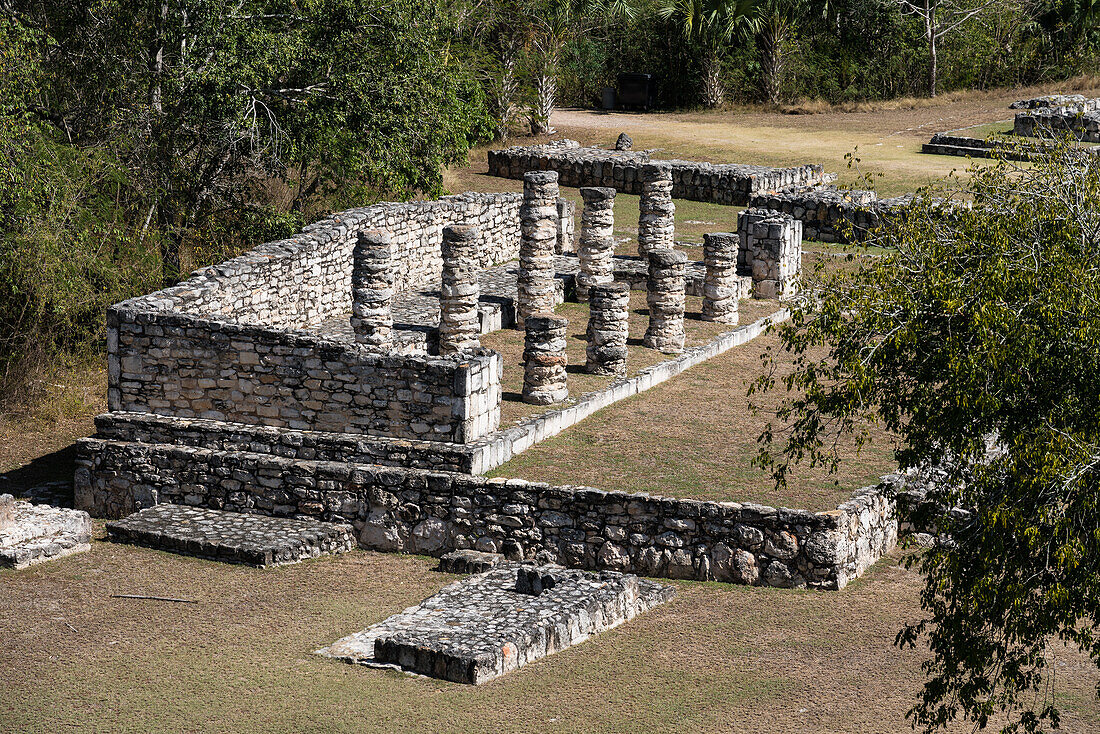 The ruins of the Post-Classic Mayan city of Mayapan, Yucatan, Mexico contained an abnormally large number of buildings with stone colonnades.