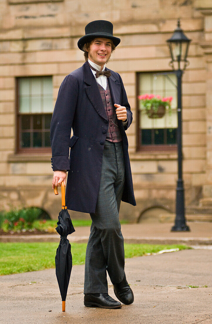 Fraser McCallum, a member of the Founders? Hall Confederation Players, leads a walking tour of historic downtown Charlottetown; Prince Edward Island, Canada.