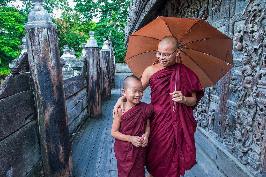 Monks at Shwenandaw Monastery in Mandalay, Myanmar