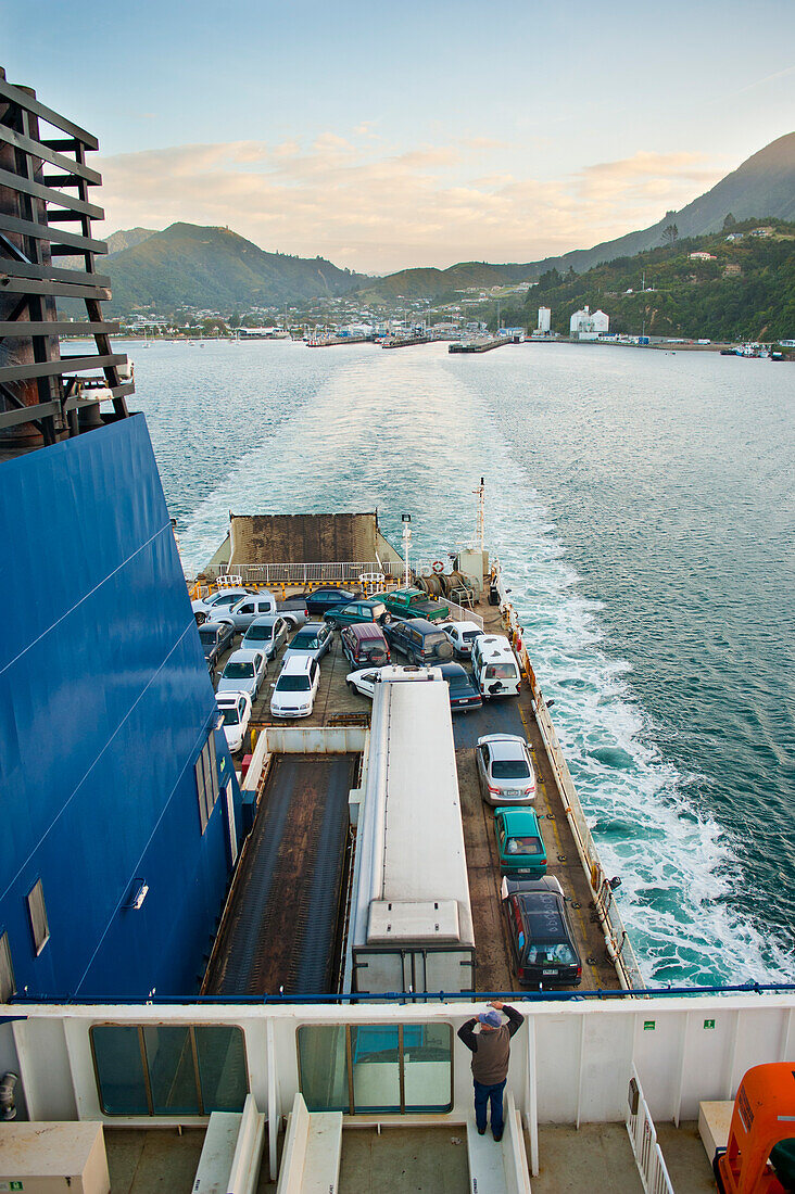 The Interislander Car Ferry Between Picton, South Island and Wellington, North Island, New Zealand. Picton is a small town in the north of South Island where you catch the interislander ferry from Picton Harbour, South Island to Wellington, North Island. It is a busy little harbour town with endless water based activities and the opportunity for a stunning cruise up the Queen Charlotte Sound. Time your ferry departure from Picton to Wellington right, however, and you won't need to do a tourist cruise as the ferry spends the first 45 minutes winding its way out of the Queen Charlotte Sound, bef