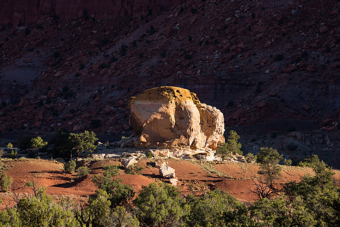 Eroded sandstone formations at sunrise in Capitol Reef National Park in Utah.