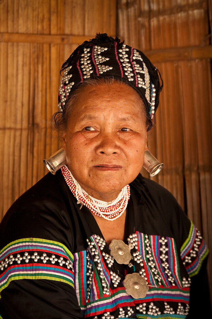 Woman in traditional dress at Baan Tong Luang village of Hmong people in rural Chiang Mai, Thailand.