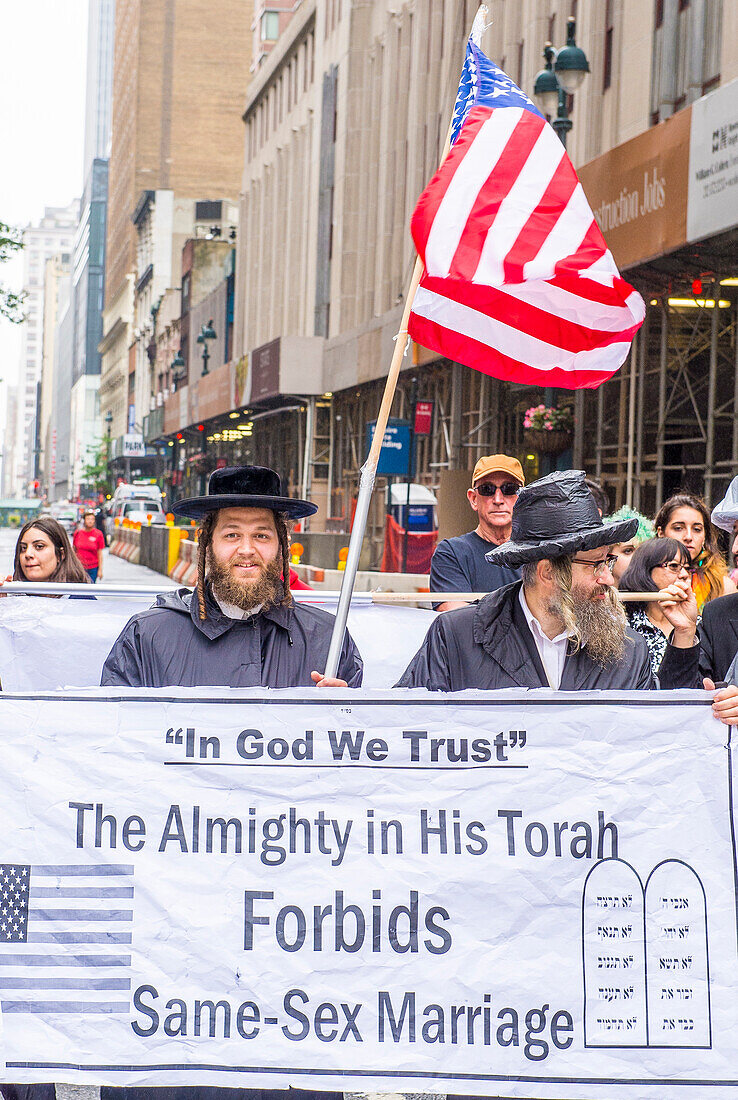 Orthodox Jews protest again the Gay Pride Parade in New York. The parade is held two days after the U.S. Supreme Court's decision allowing gay marriage.