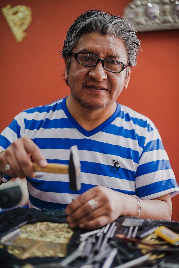 Artisan portrait at La Ronda, a famous street in the Historic Centre of the Old City of Quito, Ecuador, South America