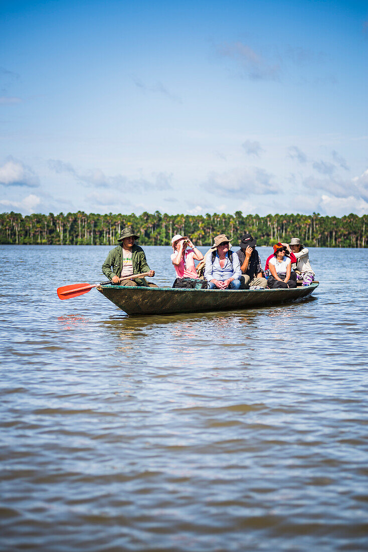 Canoe boat trip on Sandoval Lake, Tambopata National Reserve, Amazon Jungle of Peru