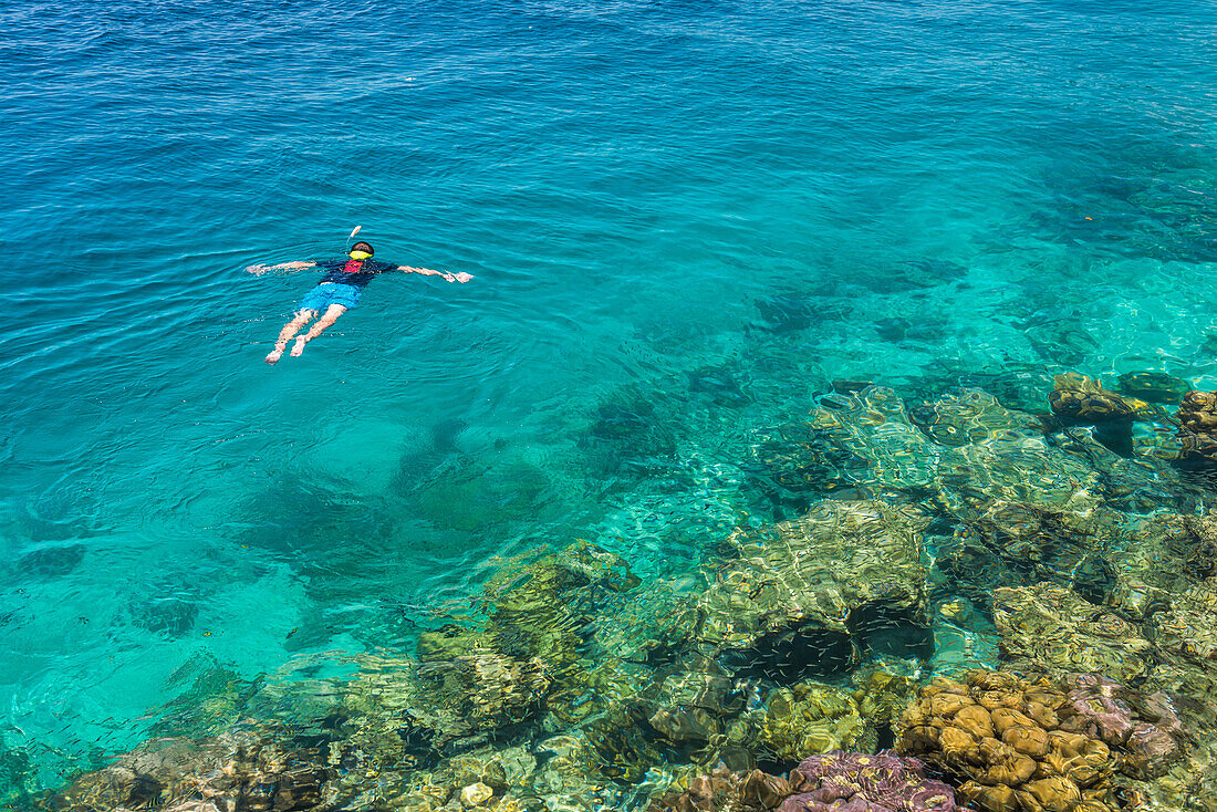 Snorkeling at Twin Beach, a tropical, white sandy beach near Padang in West Sumatra, Indonesia