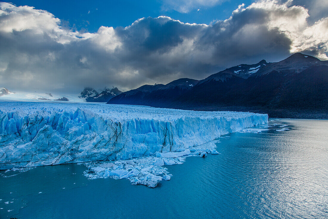 Perito Moreno Glacier and Lago Argentino in Los Glaciares National Park near El Calafate, Argentina. A UNESCO World Heritage Site in the Patagonia region of South America. At right is Cordon Reichert.