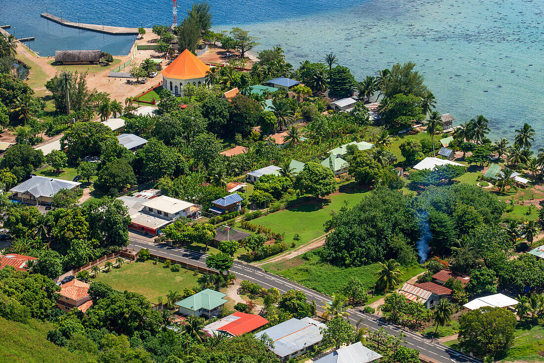 Typical houses, road, and reef see, Moorea island (aerial view), Windward Islands, Society Islands, French Polynesia, Pacific Ocean.