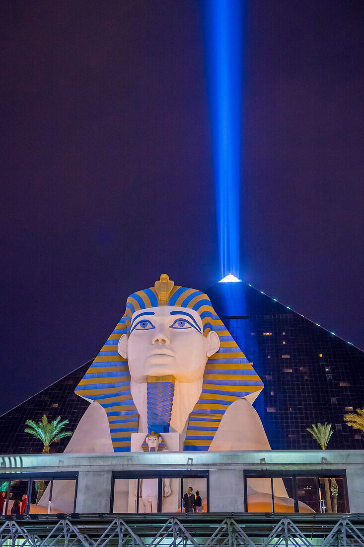 The Luxor hotel and casino on the Las Vegas Strip, contains a total of 4,400 rooms lining the interior walls of a pyramid style tower