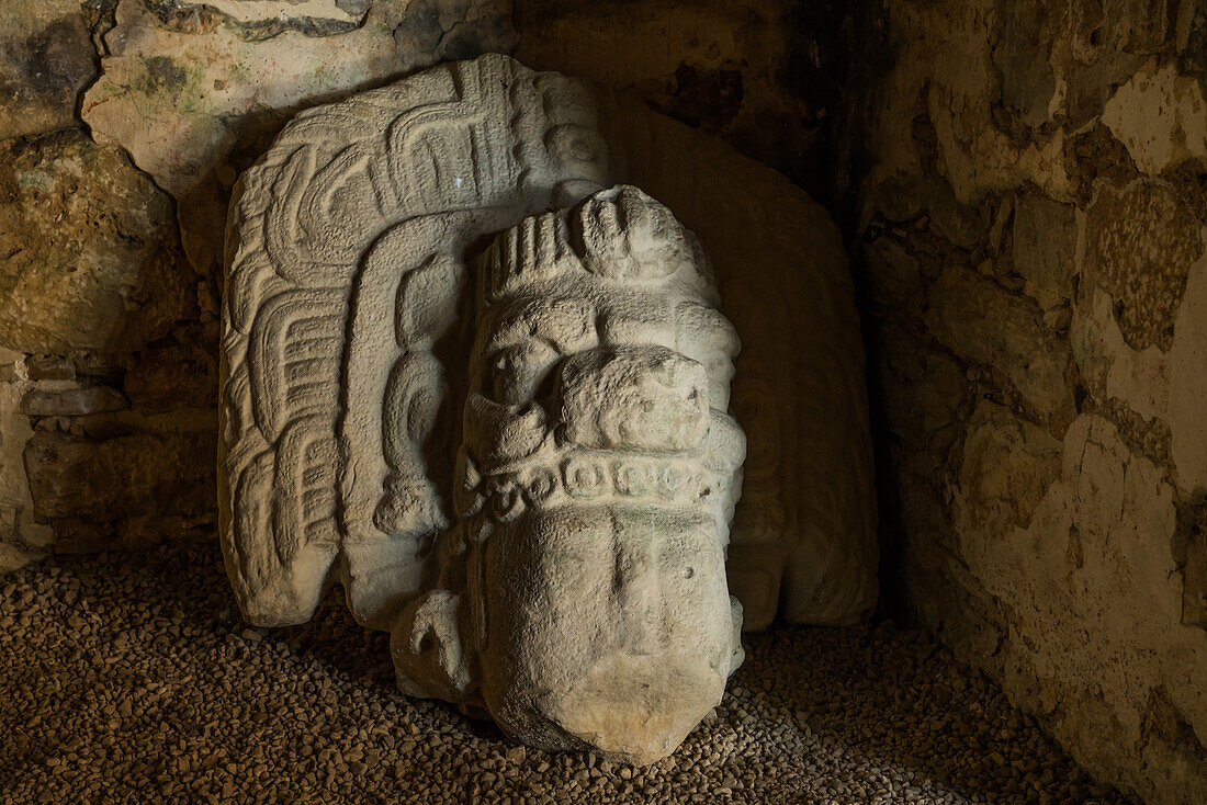 The head of the statue inTemple 33, probably of Bird Jaguar IV, in the ruins of the Mayan city of Yaxchilan on the Usumacinta River in Chiapas, Mexico.